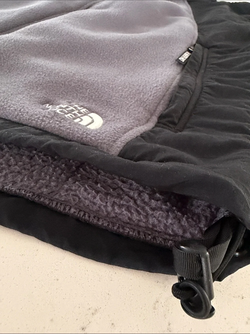 The North Face Black Shell with Gray Fleece-Lined Men's Vest